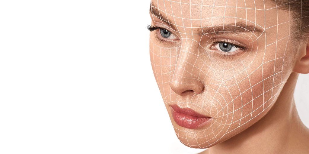 Woman's face with a grid of lines – treatment planning