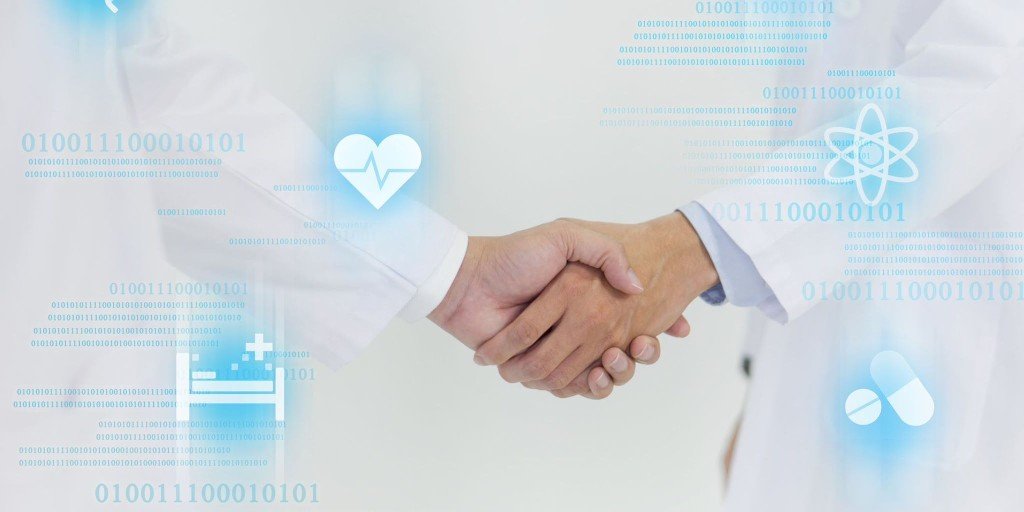 Doctor shaking hands with a patient